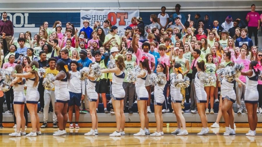 Packing in the bleachers, Millbrook Maniacs cheer on the basketball team as they continue their winning streak. Sports games are one of the most fun times during high school and are full of memories that will forever.