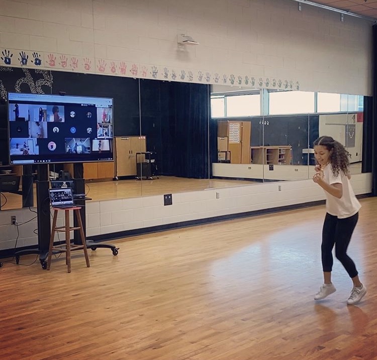 Dancing alongside her students, Ms. Cruz makes the best of remote learning. The pandemic has definitely changed the way school looks, but we will always find a way to dance together. 
