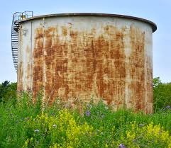 Resting on top of a field of bushes and greenery, this oil tank is similar to the one in which the bodies of Celeste and Bella Watts were discovered. Ther mother, Shannan, was found in a shallow field nearby.