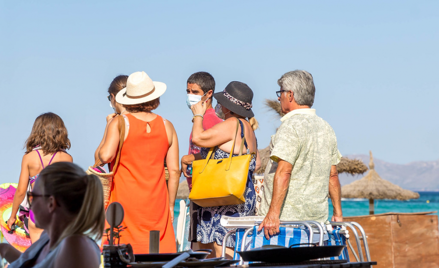 Out and about, beachgoers in Mallorca, Spain, do their best to both cool themselves off and keep safe during the coronavirus pandemic. Vacationers should continue to follow health expert’s guidelines during the upcoming spring break.
