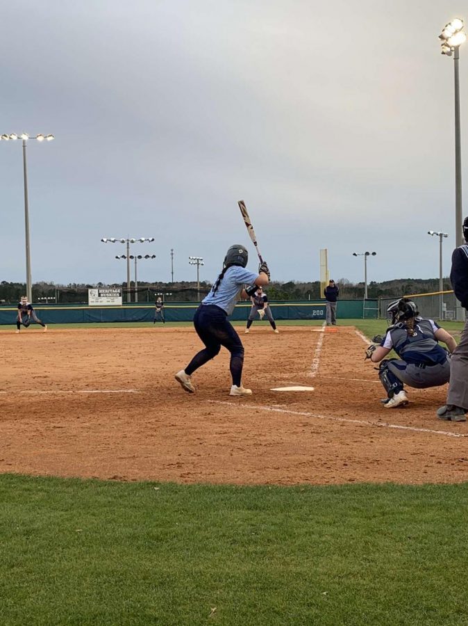 Ready to swing,  sophomore Ava Joyner waits for the pitch. She is a huge part of the team and shows leadership on and off the field. 
