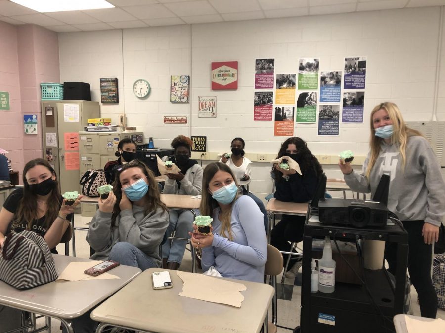 Getting into the Halloween spirit, Newspaper staff enjoys Frankenstein treats during class. The creativity and flavor made them love these wonderful treats! 
