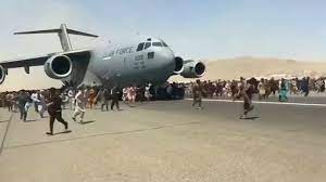 Fleeing from Afghanistan, refugees try to cling onto a USA plane to leave. It is sad to see all the innocent people who are just not able to escape to safety.
