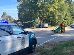 Greenville man Meleec Greene crashes into Litchford Road utility pole after police chase. Police blocked off the intersection due to damaged traffic lights. 
