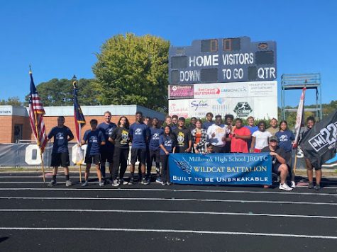 Caption: Gathered together, the Millbrook JROTC Wildcat Battalion stands together for a group picture at the Mission 22 fundraising event. After their 22-hour nonstop relay run, JROTC students take pride in raising over $4k for an organization that helps Veterans get back on their feet.  