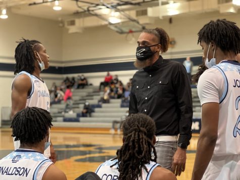 Giving his players a quick speech before their Varsity game, Coach Rise demonstrates his dedication to the Millbrook Basketball Program. He is seen as a role model by several of his student athletes.