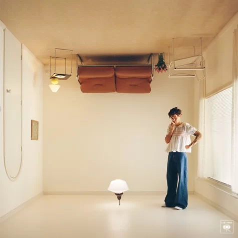 Styles’ new album cover features him inside an upside-down room, giving speculation his album will be based around a home.