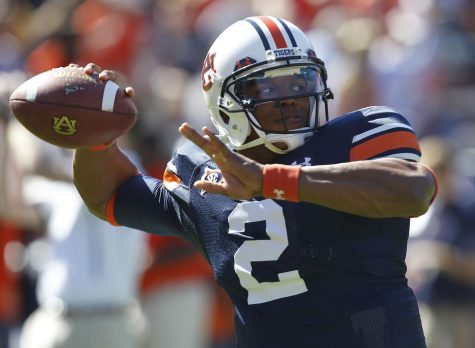 Cam Newton, current player for the Carolina Panthers playing at Auburn in 2010.
