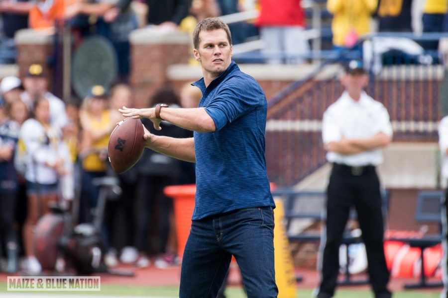 Throwing a football Brady is known as one of the greatest quarterbacks of all time, and is now going through a public divorce. While still playing for the Tampa Bay Buccaneers, Brady is having to balance a lot. 

