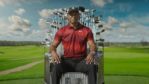 The “King of Golf” Tiger woods sitting on a Club throne for the photoshoot of PGA TOUR 2K. 
