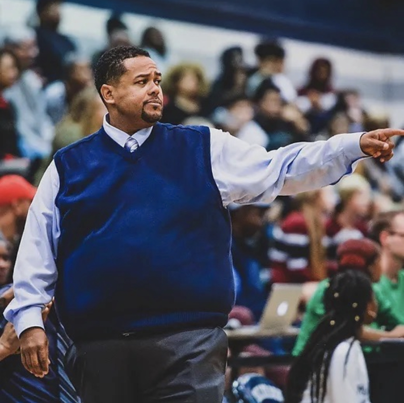 Coach Davis coaching the 2023 Mens Varsity Basketball season.