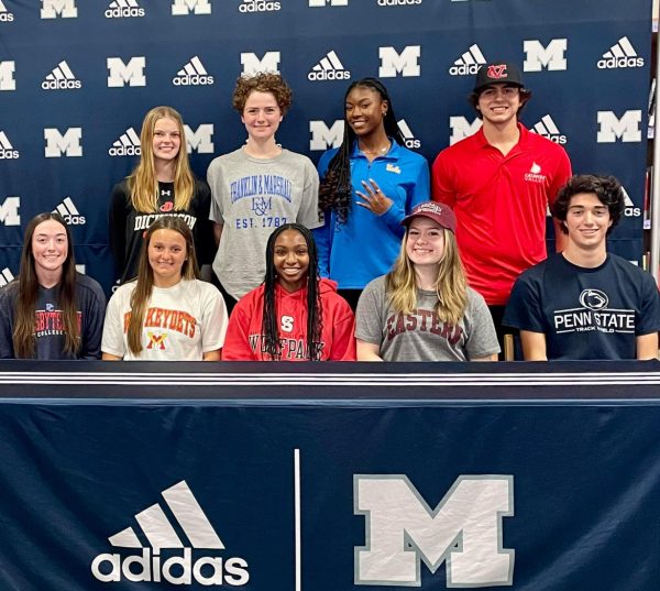 Millbrook signing day athletes come together to celebrate their accomplishments. 