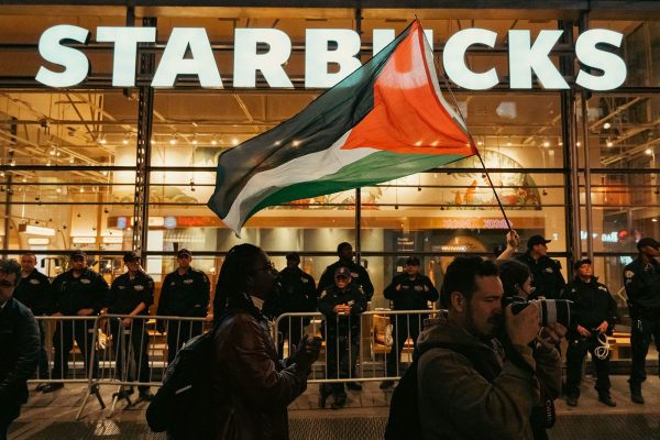  A pro-Palestine protest in front of Starbucks. Starbucks is among a wave of business being boycotted by pro-Palestinian activists.
