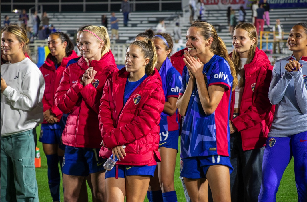 Tyler Lussi, Ashley Sanchez, Dani Weatherholt and the rest of the North Carolina Courage watch Sam Mewiss Ring of Honor Induction after their home opener.