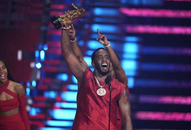   Sean “Diddy” Combs accepts the Global Icon Award during the MTV Video Music Awards in September 2023. 