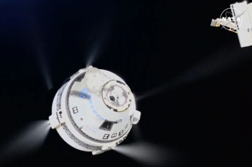 
Boeing Starliner Spacecraft departing from the ISS without its original passengers. 
