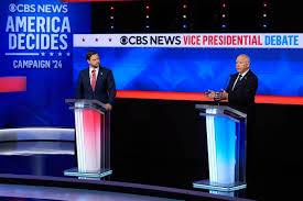 Senator J.D. Vance and Governor Tim Walz speaking during the Vice Presidential Debate.