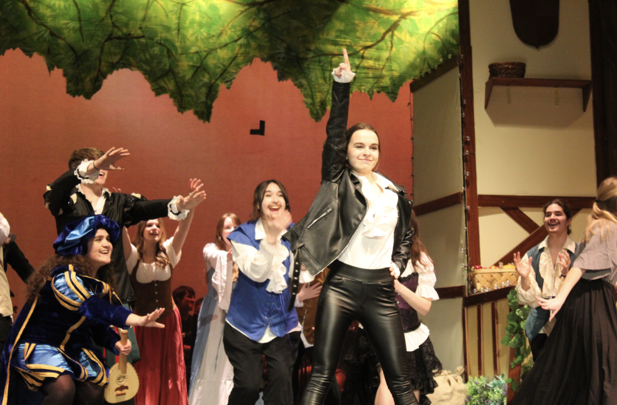  Madeline Atwater (center) as William Shakespeare for the musical, “Something Rotten!” The musical took place March 13-15th. 